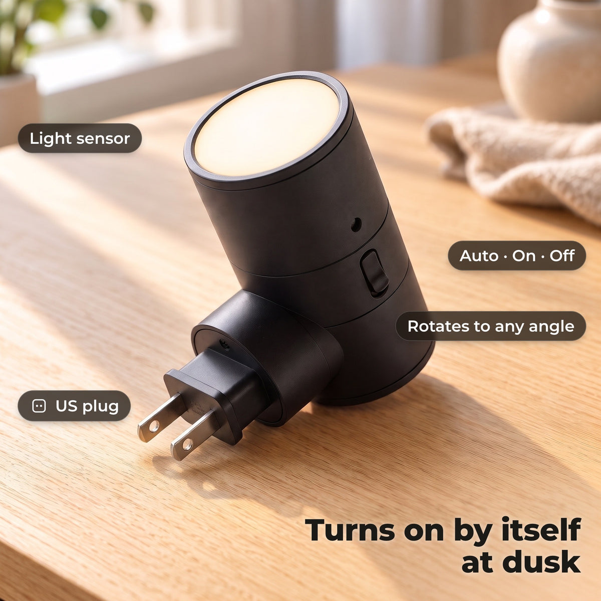 Close-up of the light sensor, Auto/On/Off switch and rotatable EU plug
